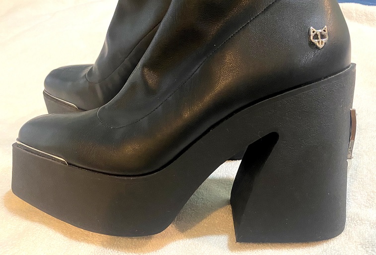 Step Up Your Style Game with Women's Chunky Sole Black Leather Boots by Naked Wolfe - Size 8